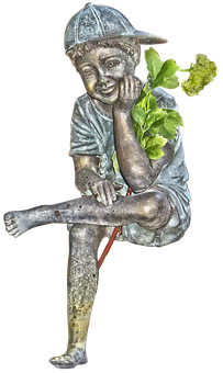 A Statue Of A Boy Holding A Plant