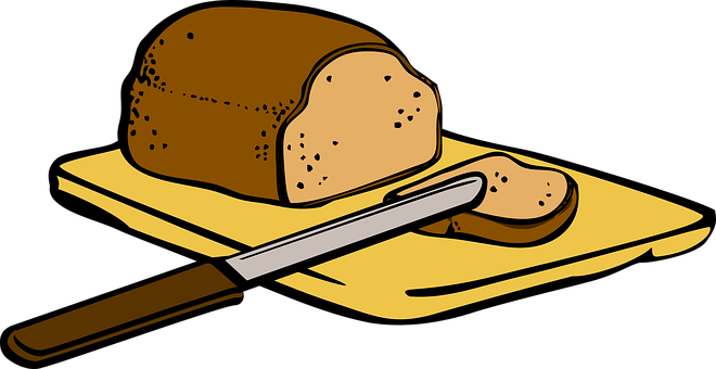A Loaf Of Bread And A Knife