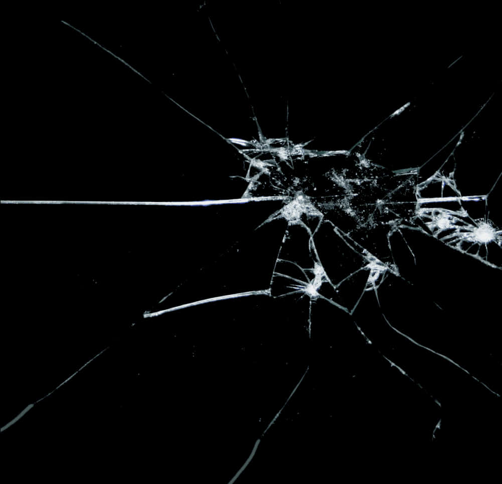 A Broken Glass With Many Cracks