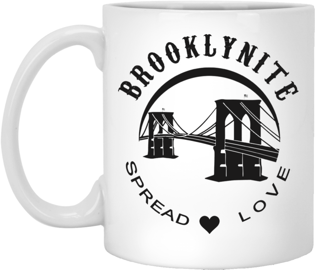 A White Mug With A Bridge And Text