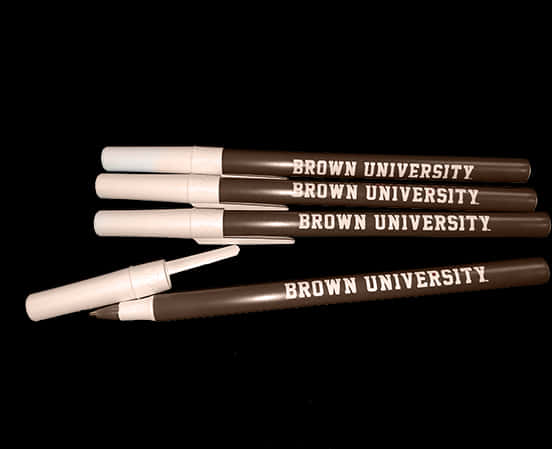 A Group Of Brown Pens