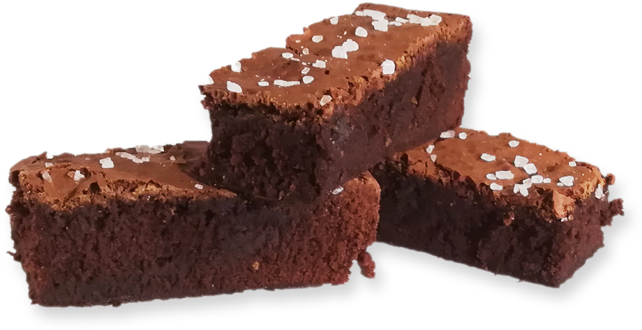 A Stack Of Brownies With White Specks