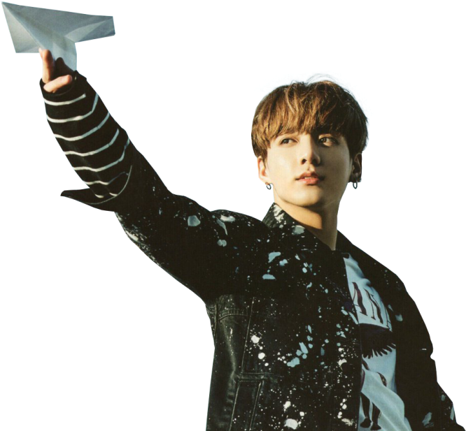 A Person Holding A Paper Airplane