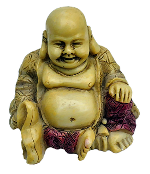 A Statue Of A Smiling Buddha