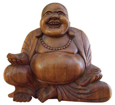 A Wood Carving Of A Smiling Buddha