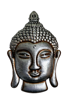A Silver Statue Of A Buddha