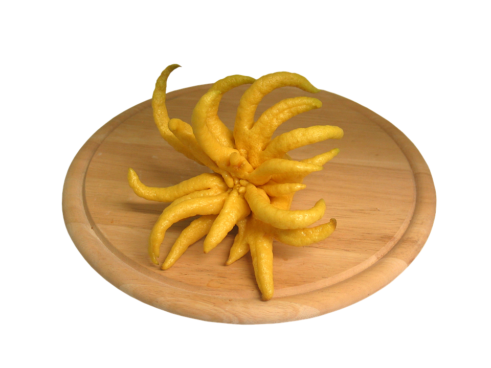 A Yellow Food On A Wooden Board