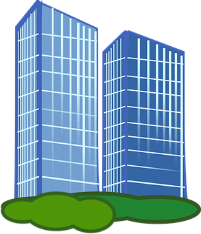 A Pair Of Tall Buildings With Green Grass