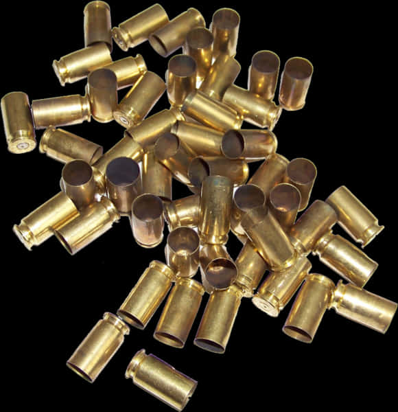 A Pile Of Gold Colored Bullets