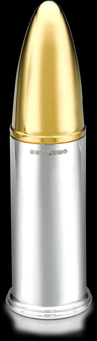 A Silver And Gold Canister