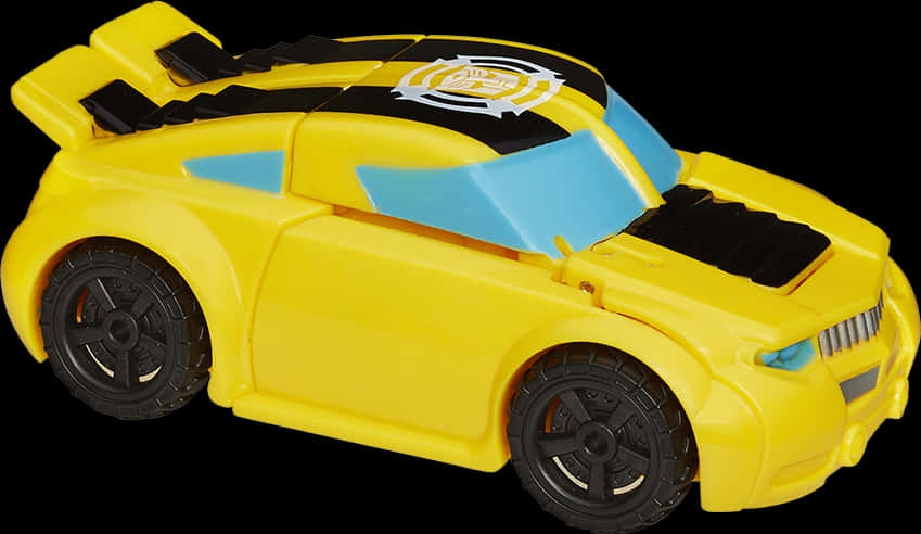 A Yellow And Black Toy Car