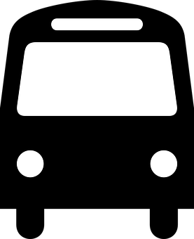 A White Bus With Two Headlights