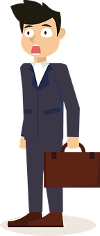 A Man In A Suit Holding A Briefcase
