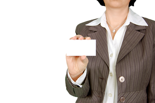 A Woman Holding A Card