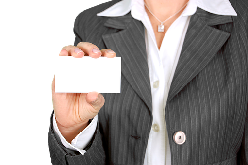 A Person Holding A Card
