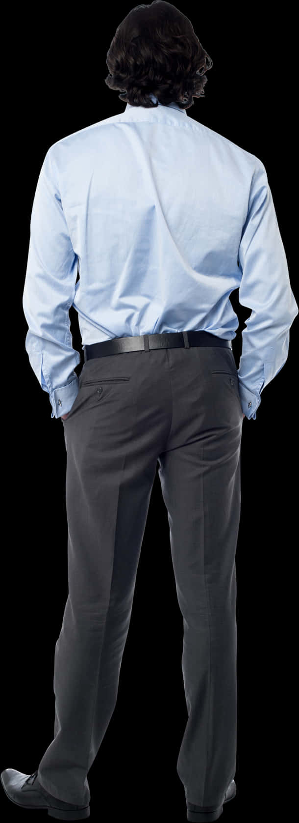 A Man In A Blue Shirt And Gray Pants