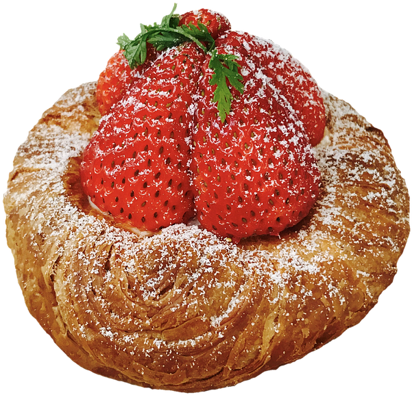 A Pastry With Strawberries And Powdered Sugar