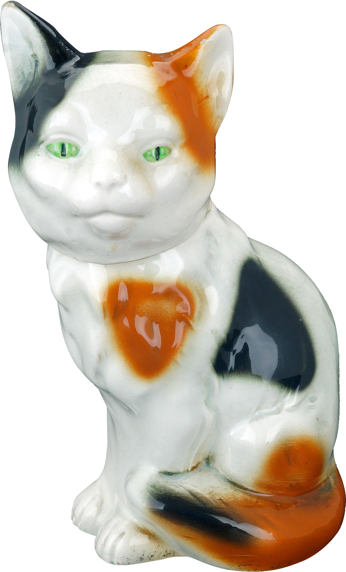 A Ceramic Cat Statue With Green Eyes