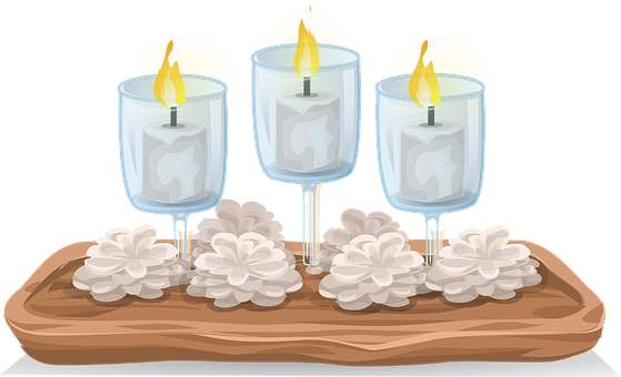A Group Of Candles In Wine Glasses With White Flowers