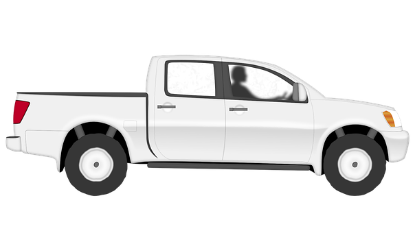 A White Truck With A Person In The Window