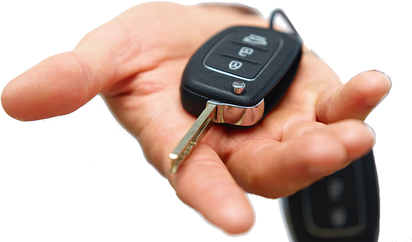 A Hand Holding A Car Key