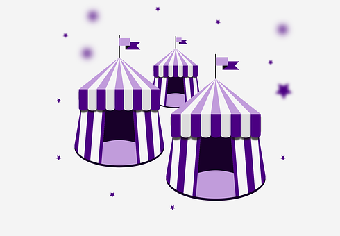 A Group Of Purple And White Striped Tents