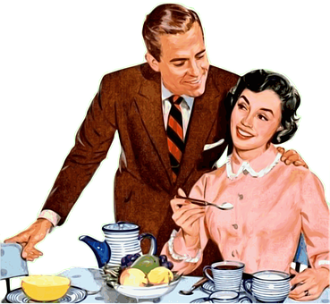 A Man Feeding A Woman At A Table