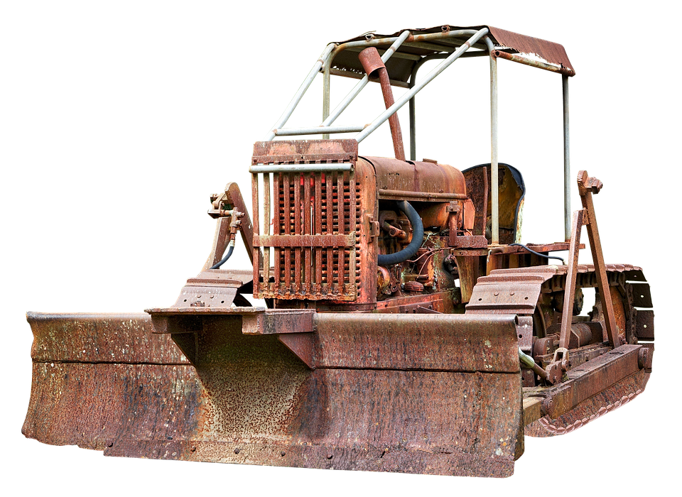 A Rusty Bulldozer With A Black Background