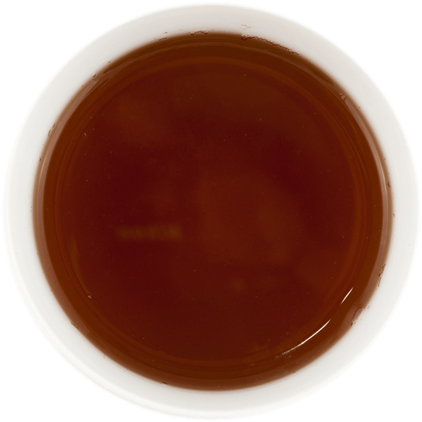 A Cup Of Brown Liquid