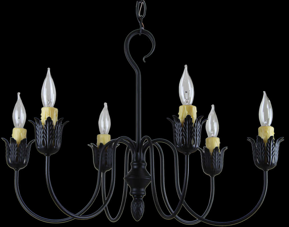 A Black Chandelier With Candles