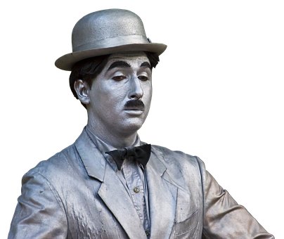 A Man In Silver Suit And Hat