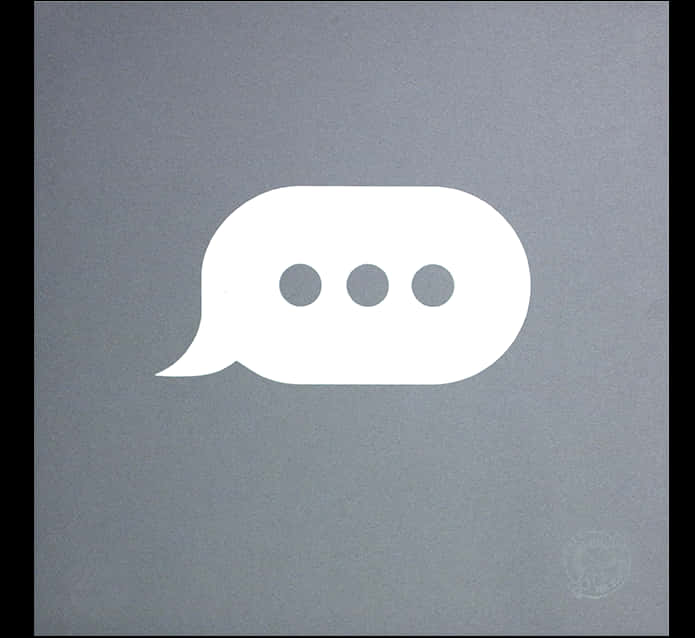 A White Speech Bubble With Three Dots
