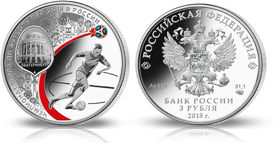 A Silver Coin With A Picture Of A Man Playing Football
