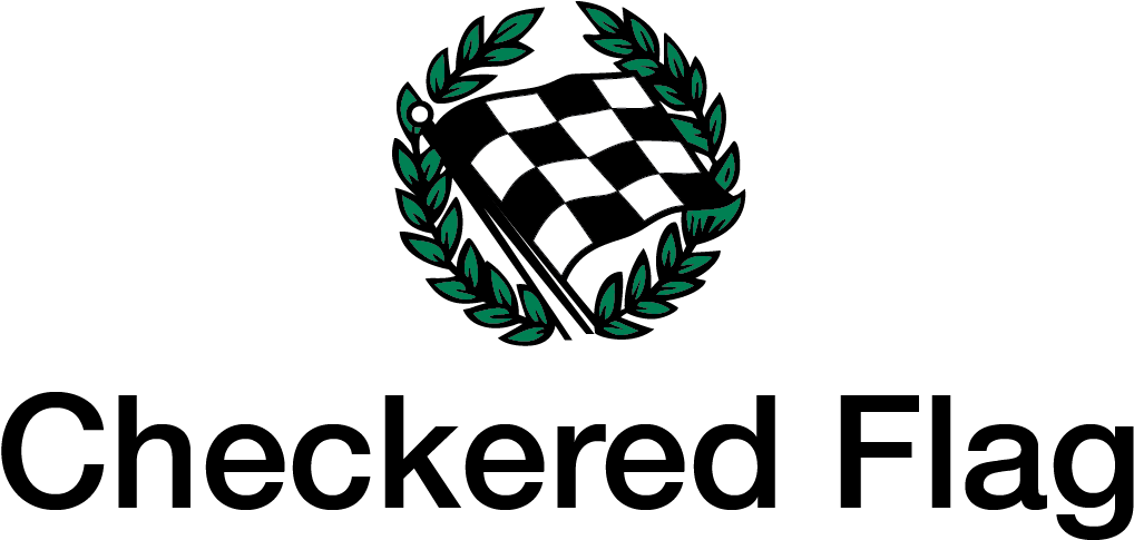 A Black And White Checkered Flag With Green Leaves