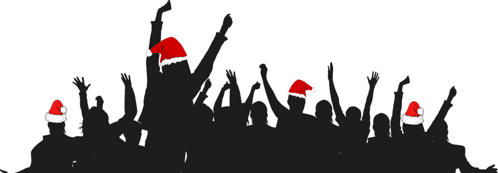 A Group Of People Wearing Santa Hats