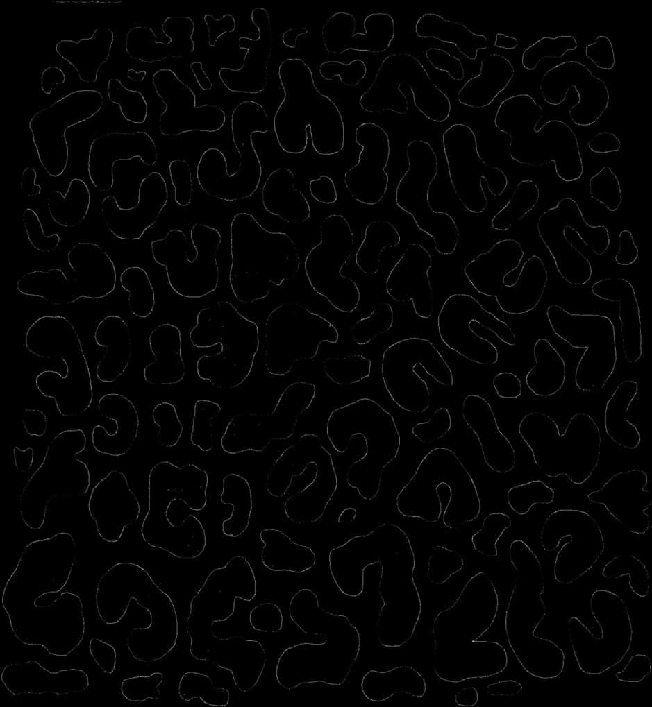 A Black And White Background With Spots