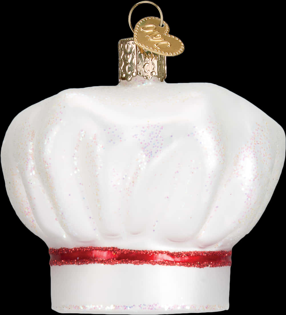 A White Christmas Ornament With A Chef Hat