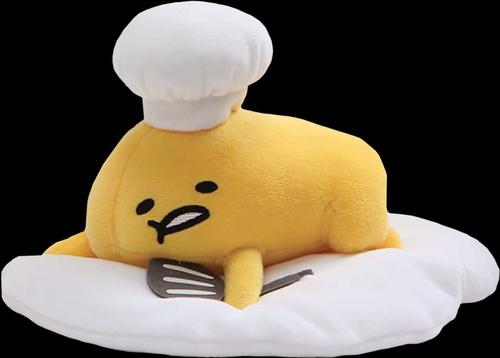 A Stuffed Animal With A Chef Hat On Top Of It