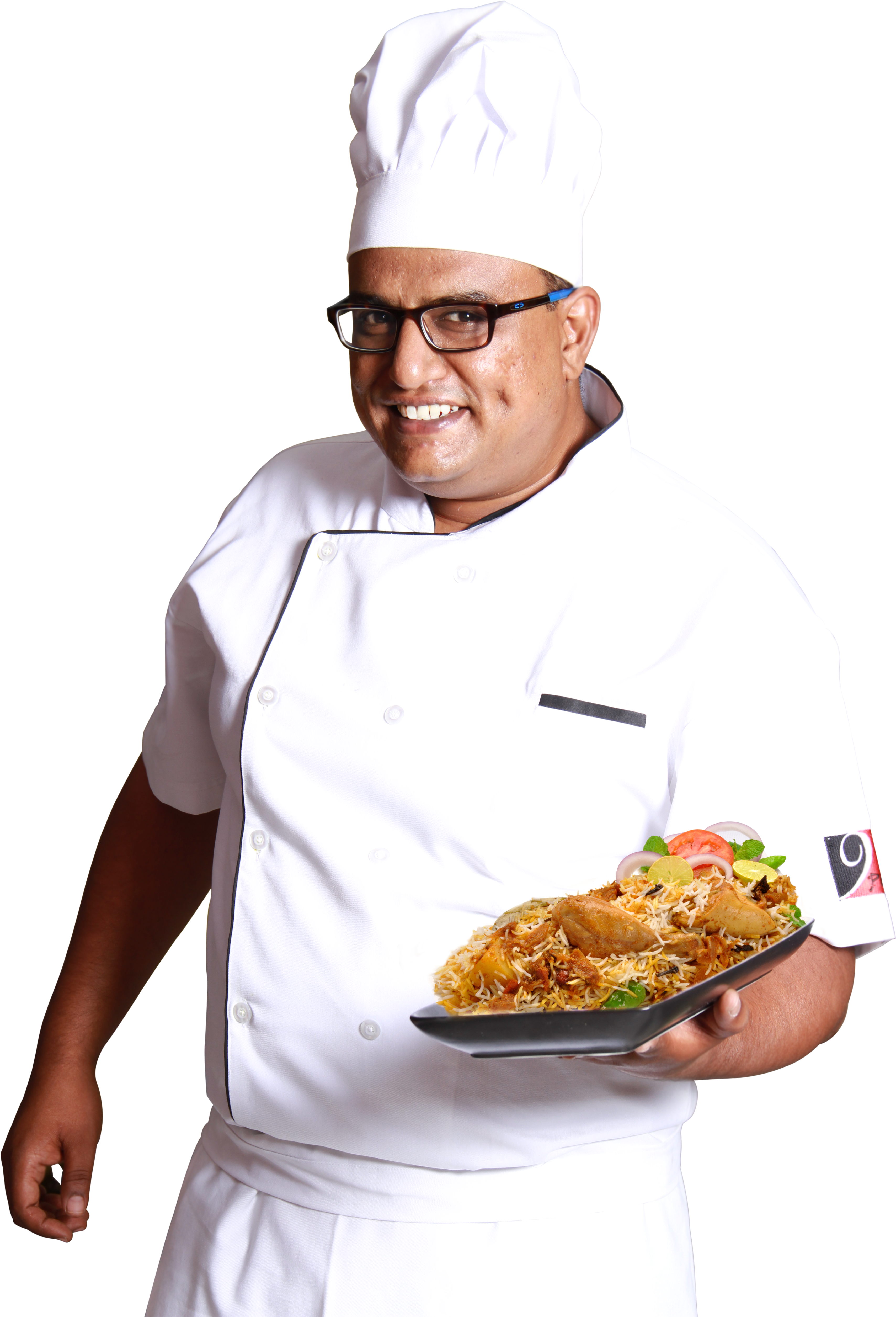 A Man In A Chef's Uniform Holding A Plate Of Food