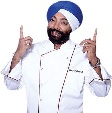 A Man Wearing A Turban And A White Chef Coat