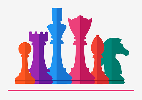 A Group Of Colorful Chess Pieces