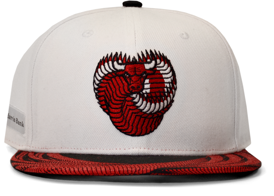 A White And Red Hat With A Red And Black Design