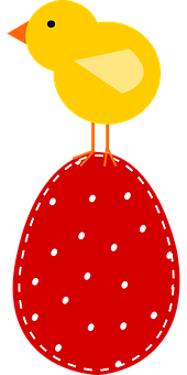 A Yellow Bird Standing On A Red Egg