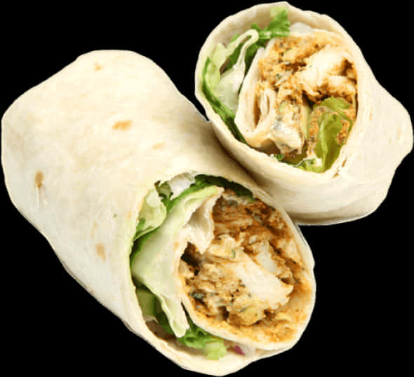 A Burrito With Chicken And Lettuce
