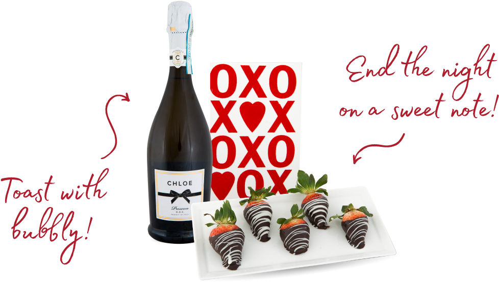 A Bottle Of Champagne And Chocolate Covered Strawberries
