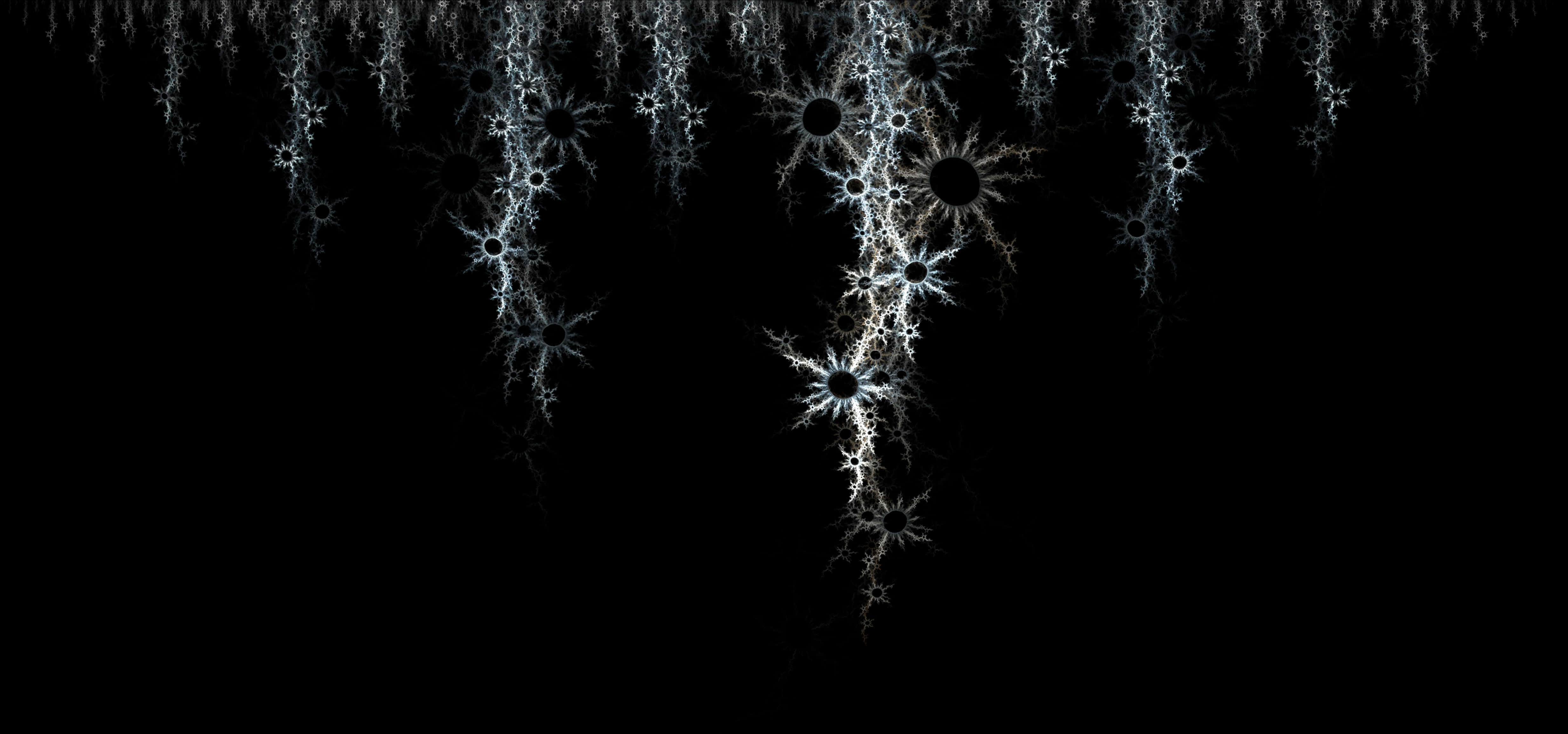 A Black Background With White And Grey Snowflakes
