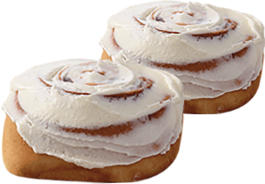 A Pair Of Cinnamon Rolls With White Frosting