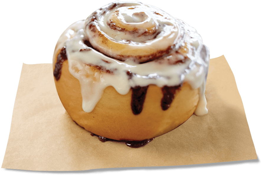 A Cinnamon Roll With Icing On Top