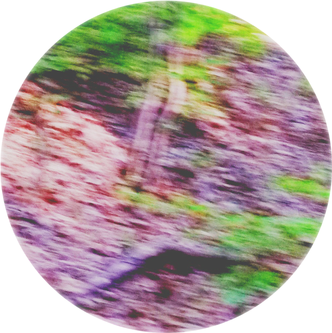 A Blurry Image Of A Colorful Planet