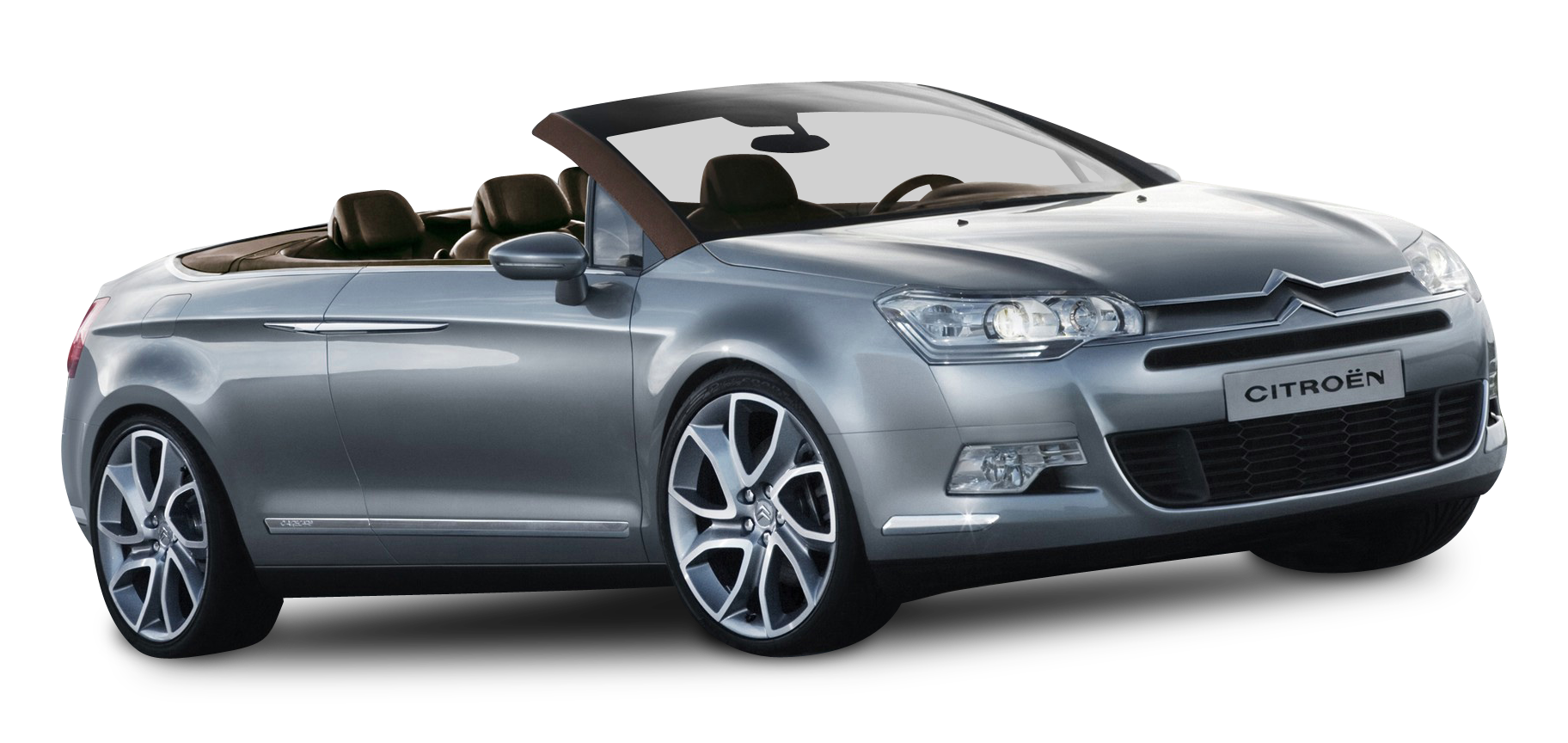 A Silver Convertible Car With A Black Background